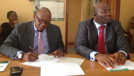 L-R Uche Nworah & Dr. Anthony Okoye at the signing of the ten-months commercial broadcasting partnership